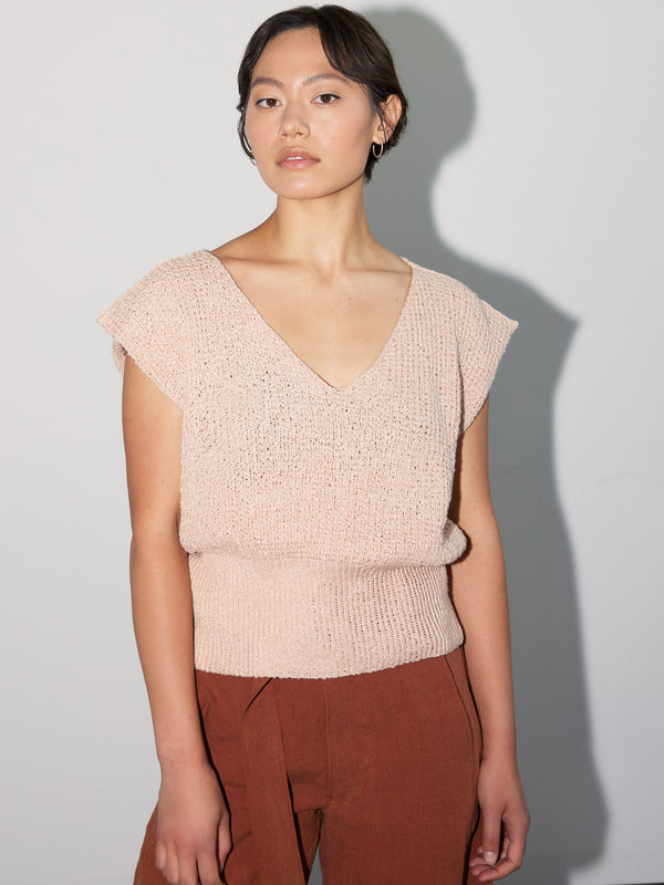 Model wearing the contemporary Kurt Top made from a stylish Daughter Judy knitting pattern