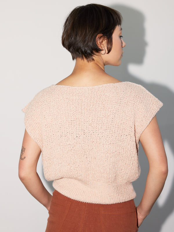 Rear view of model wearing the contemporary Kurt Top made from a stylish Daughter Judy knitting pattern